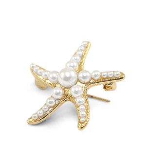 Broche zeester met parels - Goudkleurig statement accessoire